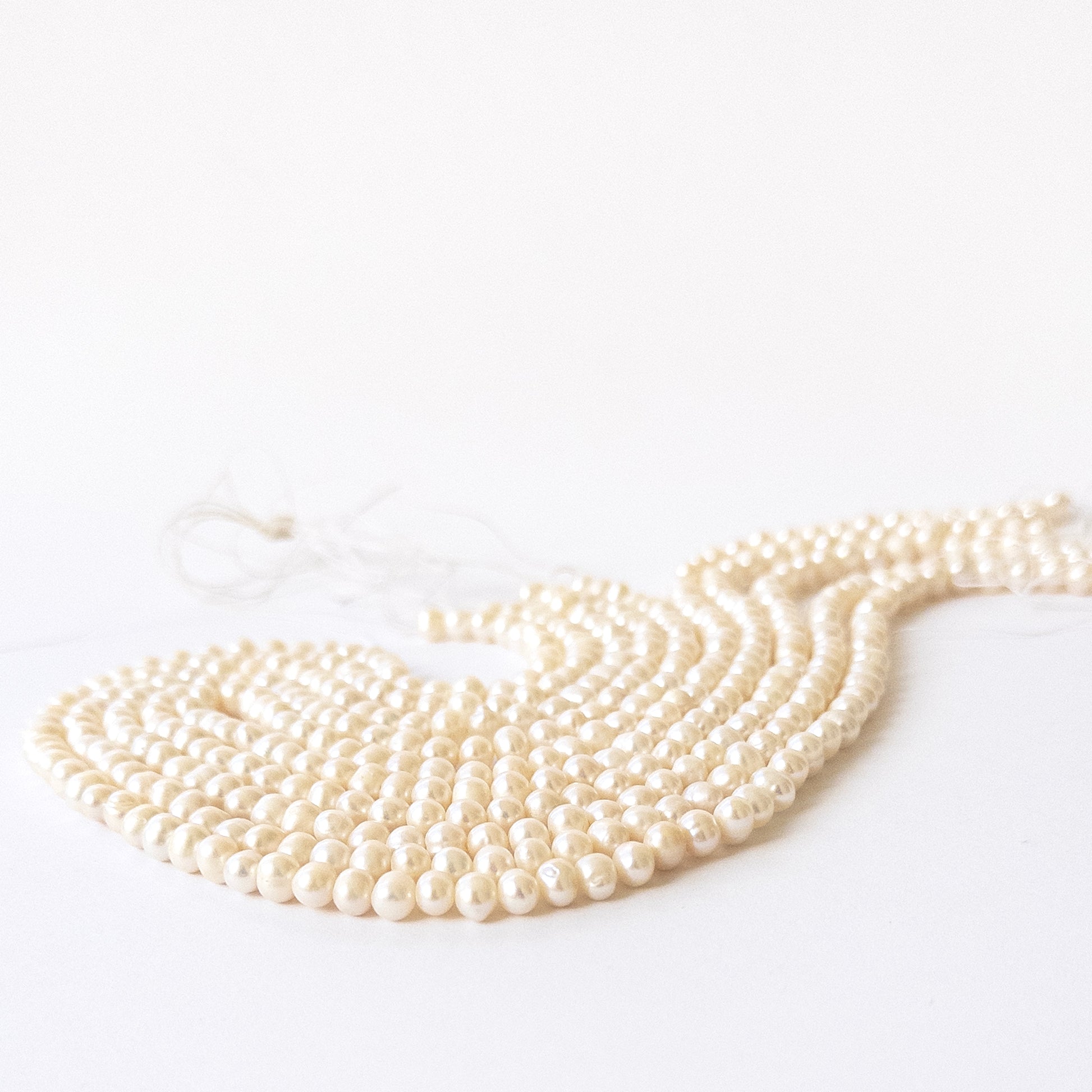 Authentic Freshwater Pearl smooth rondelle gemstone beads ideal for DIY jewellery and handmade designs.