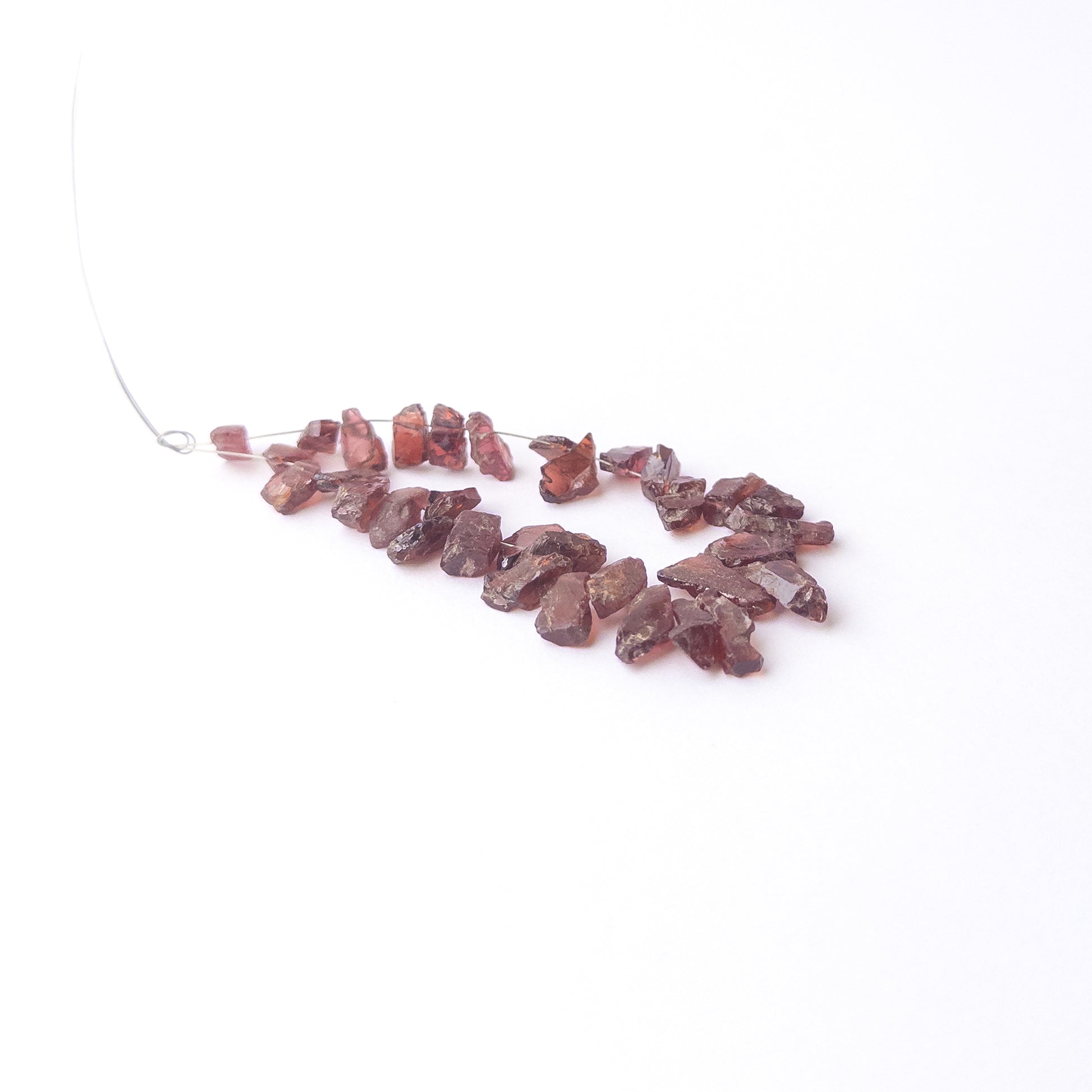 High‑quality Garnet drilled rough beads with rich red sparkle ideal for handmade jewellery components.