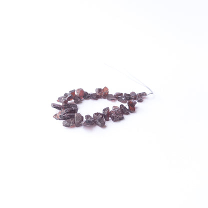 High‑quality Garnet drilled rough beads with rich red shine ideal for handmade jewellery components.