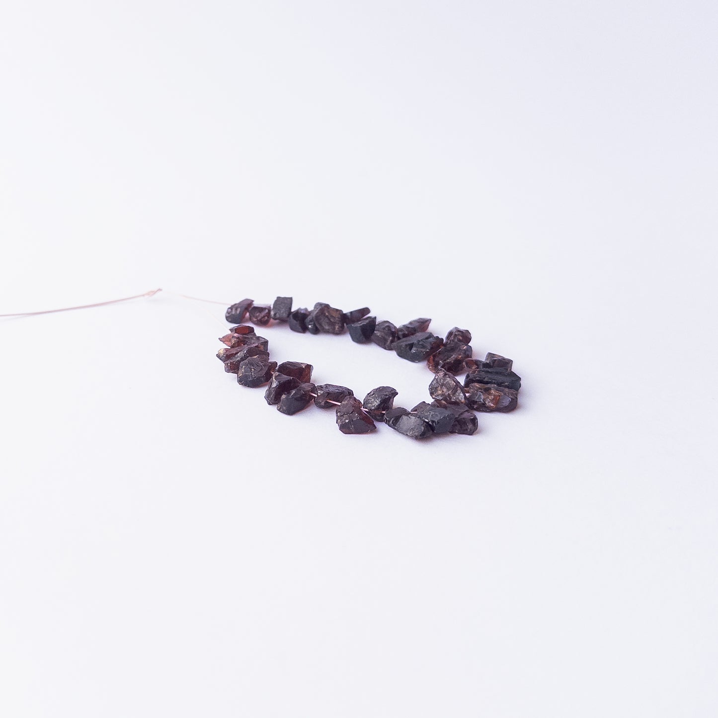 High‑quality Garnet drilled rough beads with rich red sparkle ideal for handmade jewellery components.