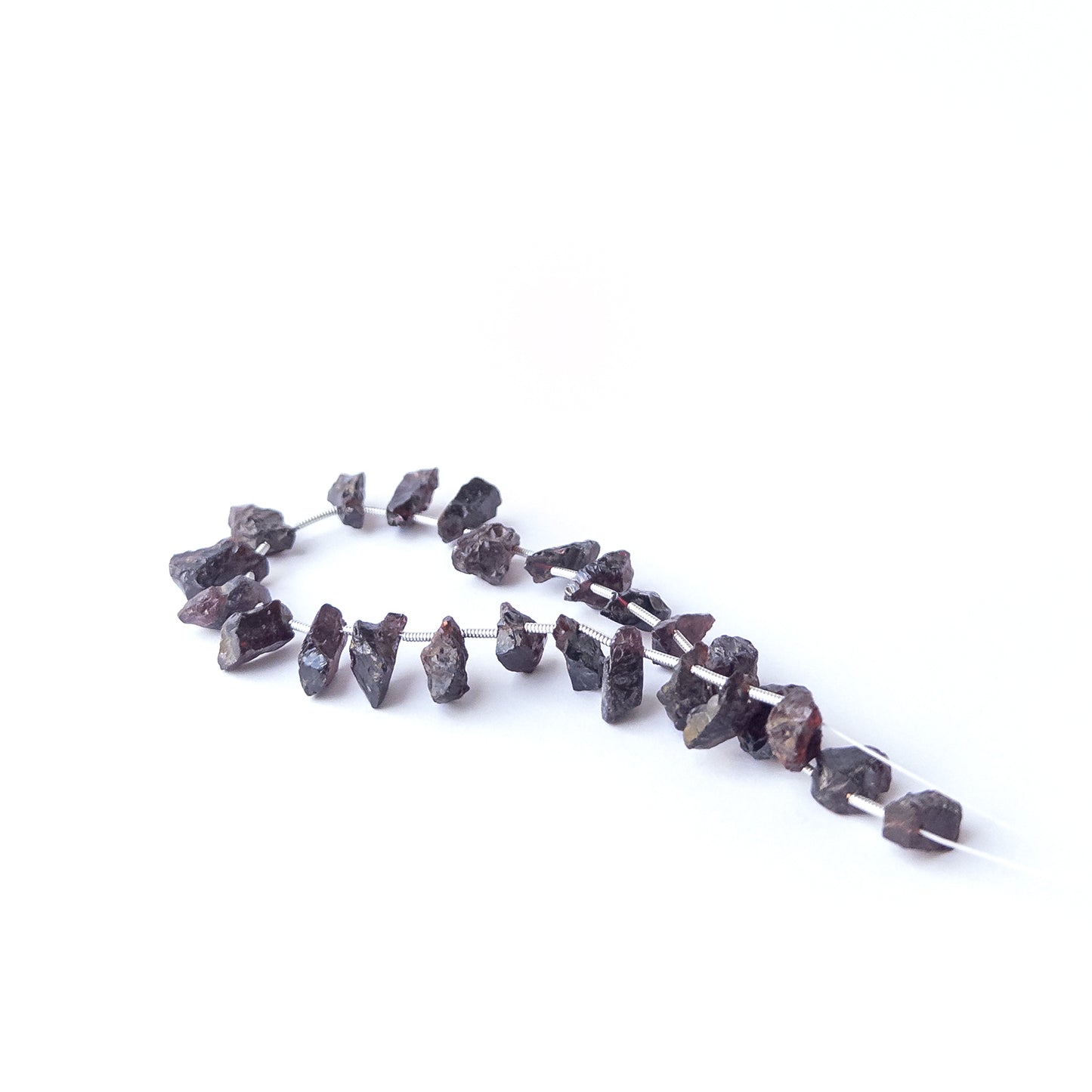 Garnet drilled rough beads sized 6–7mm, high‑quality gemstone beads suited for bold handmade jewellery creations.
