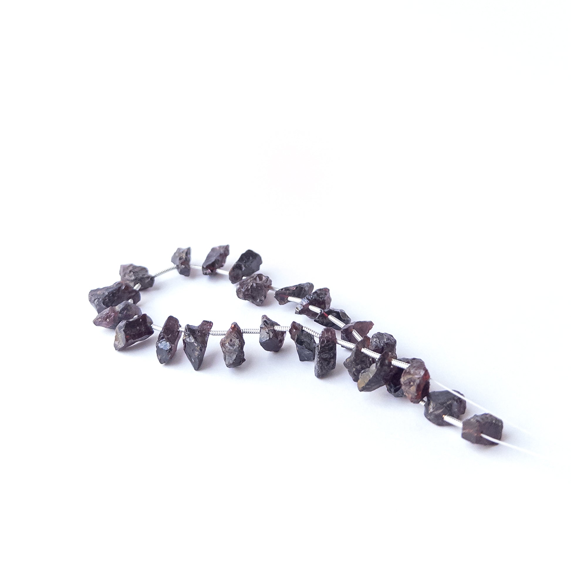 Garnet drilled rough beads sized 6–7mm, high‑quality gemstone beads suited for bold handmade jewellery creations.
