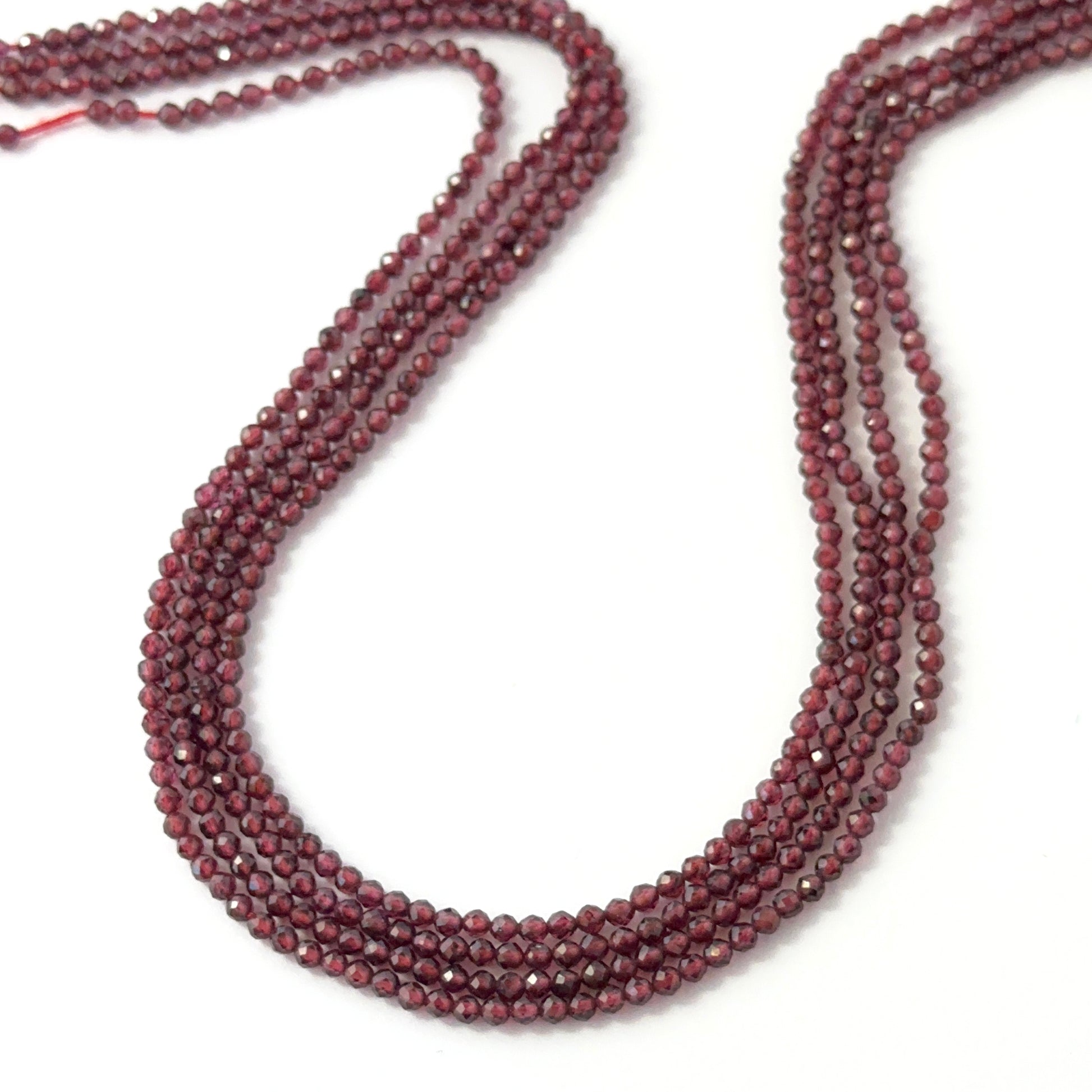 2.5mm faceted Garnet rondelle beads on a 32cm strand for jewellery making
