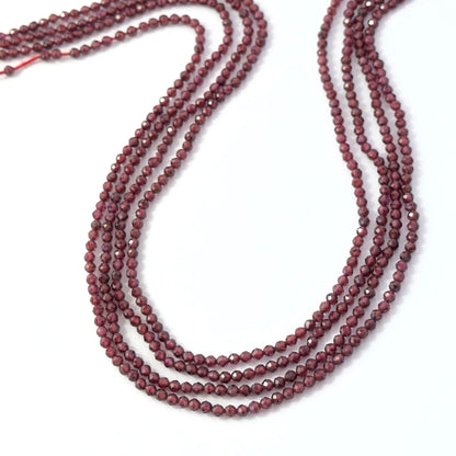 Polished faceted Garnet rondelle beads in rich red tones, 2.5mm size