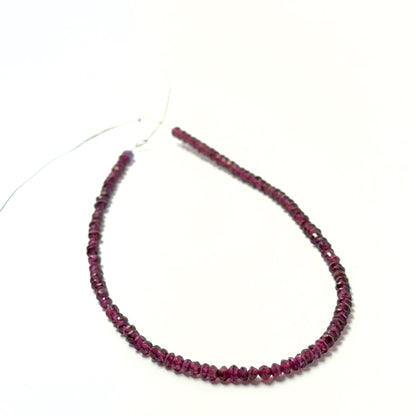Deep red garnet rondelle beads with crisp faceting and smooth polish, perfect for premium handmade jewellery designs.