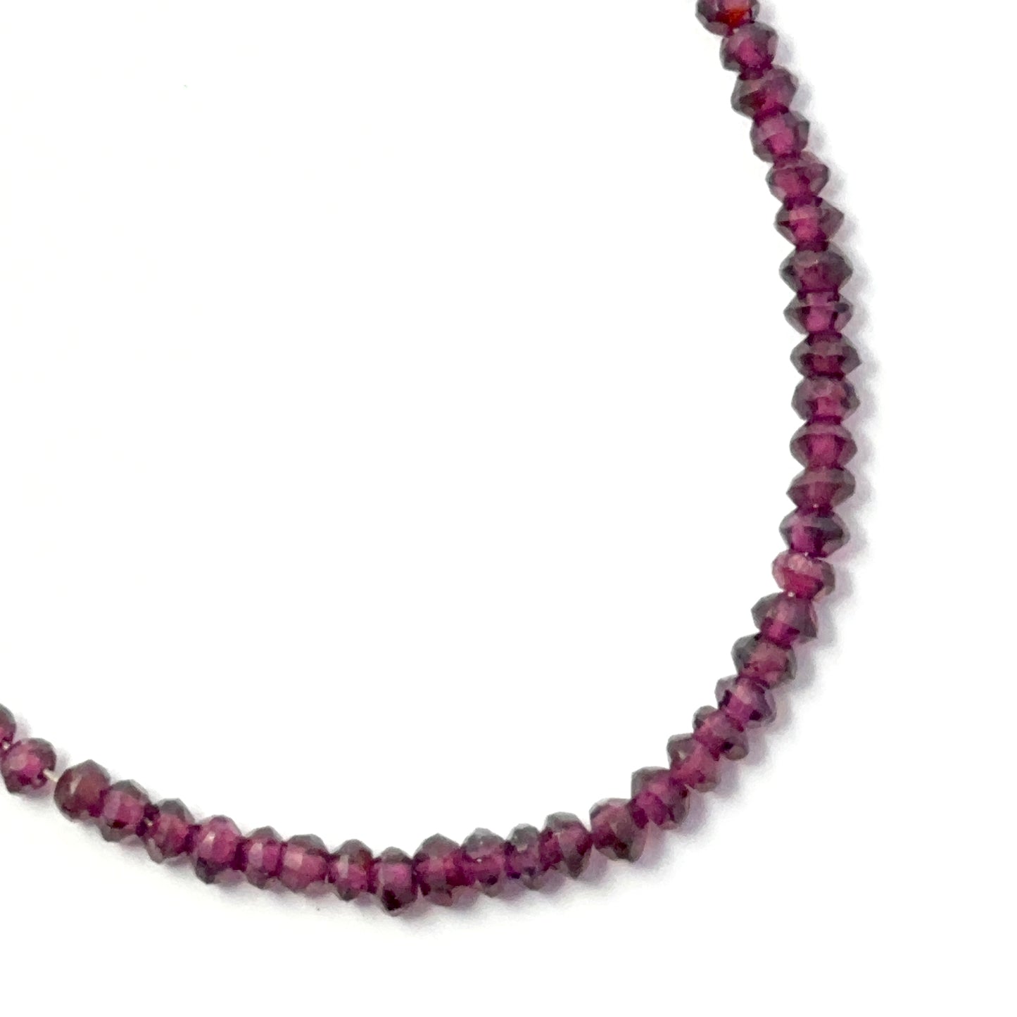 Authentic garnet gemstone beads in faceted rondelle cut, showcasing rich colour and quality craftsmanship for DIY jewellery.