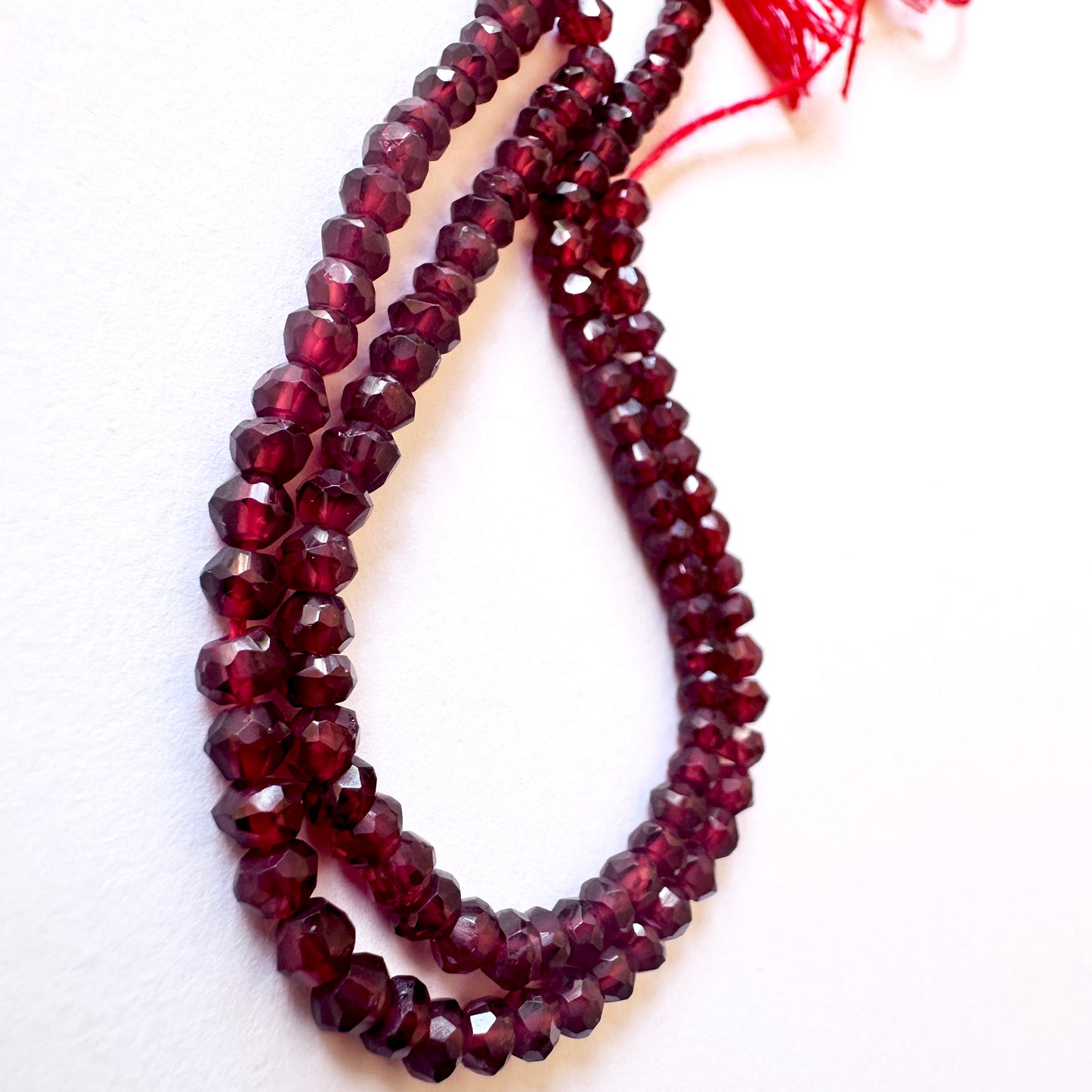 Handmade jewellery components made from 4mm Garnet beads with 0.5mm drilled holes.