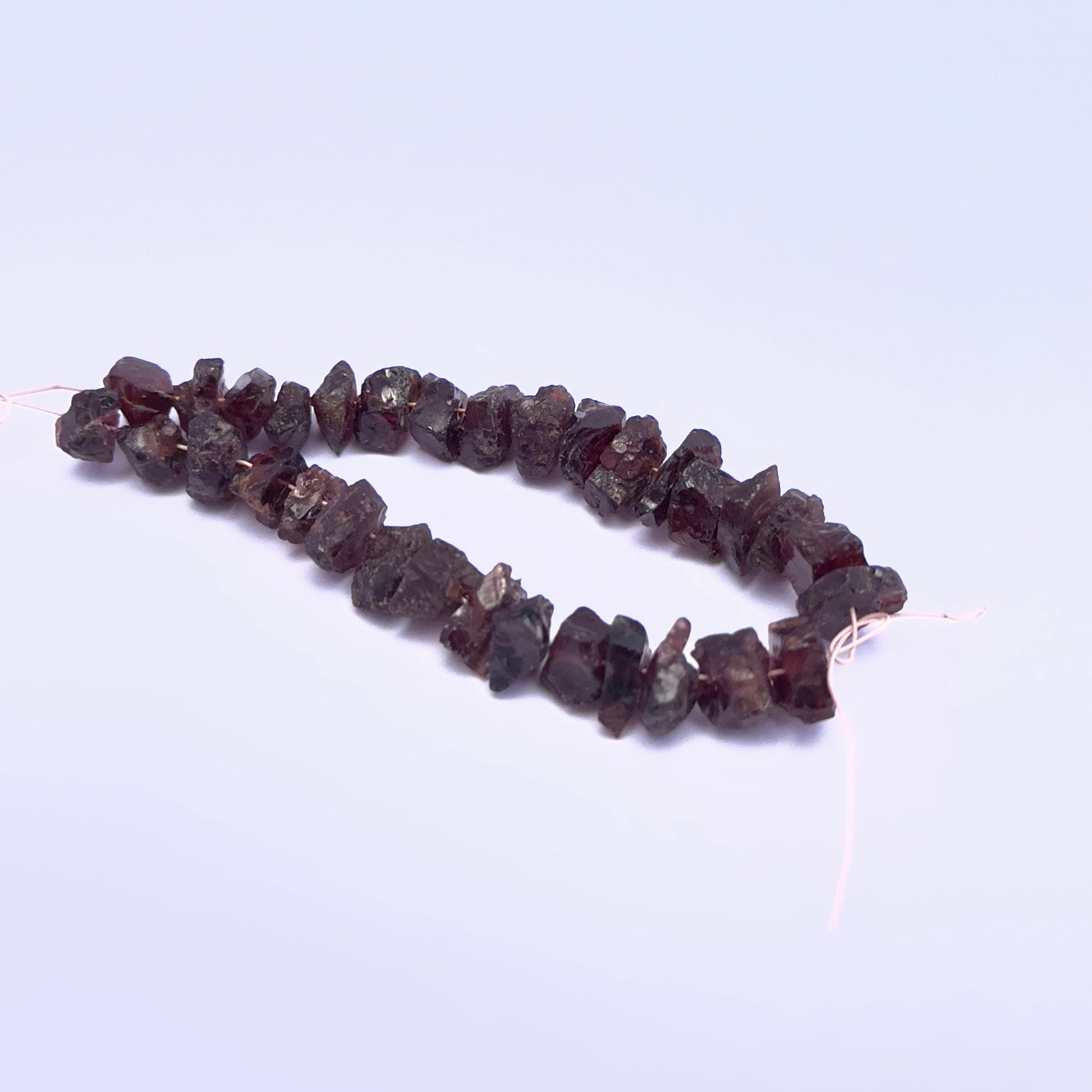 Natural Garnet stone beads with irregular shapes and organic character.