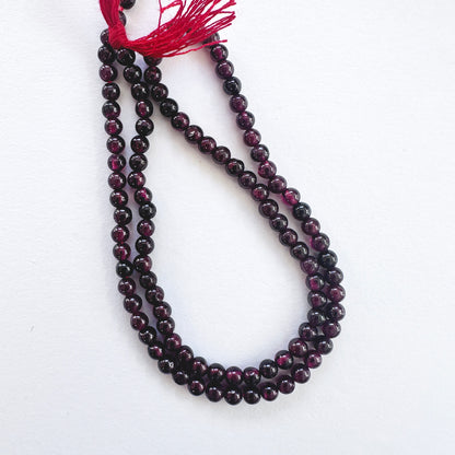 Handmade jewellery components featuring 3.5mm Garnet stone beads.