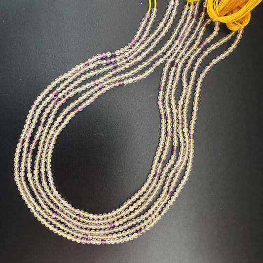 Golden Rutile faceted rondelle beads with golden inclusions and sparkling 2.6mm cut.