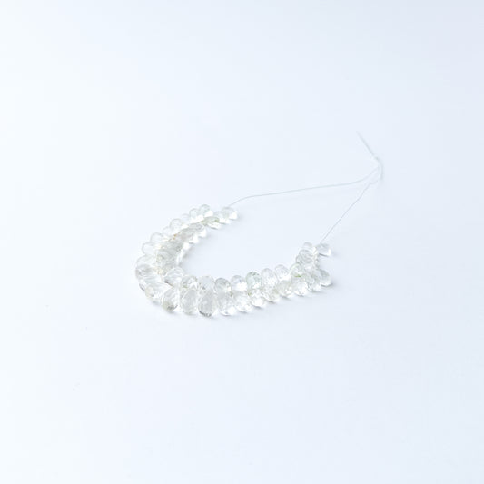 Genuine Green Amethyst gemstone beads displaying beautiful light reflection and premium gemstone craftsmanship.