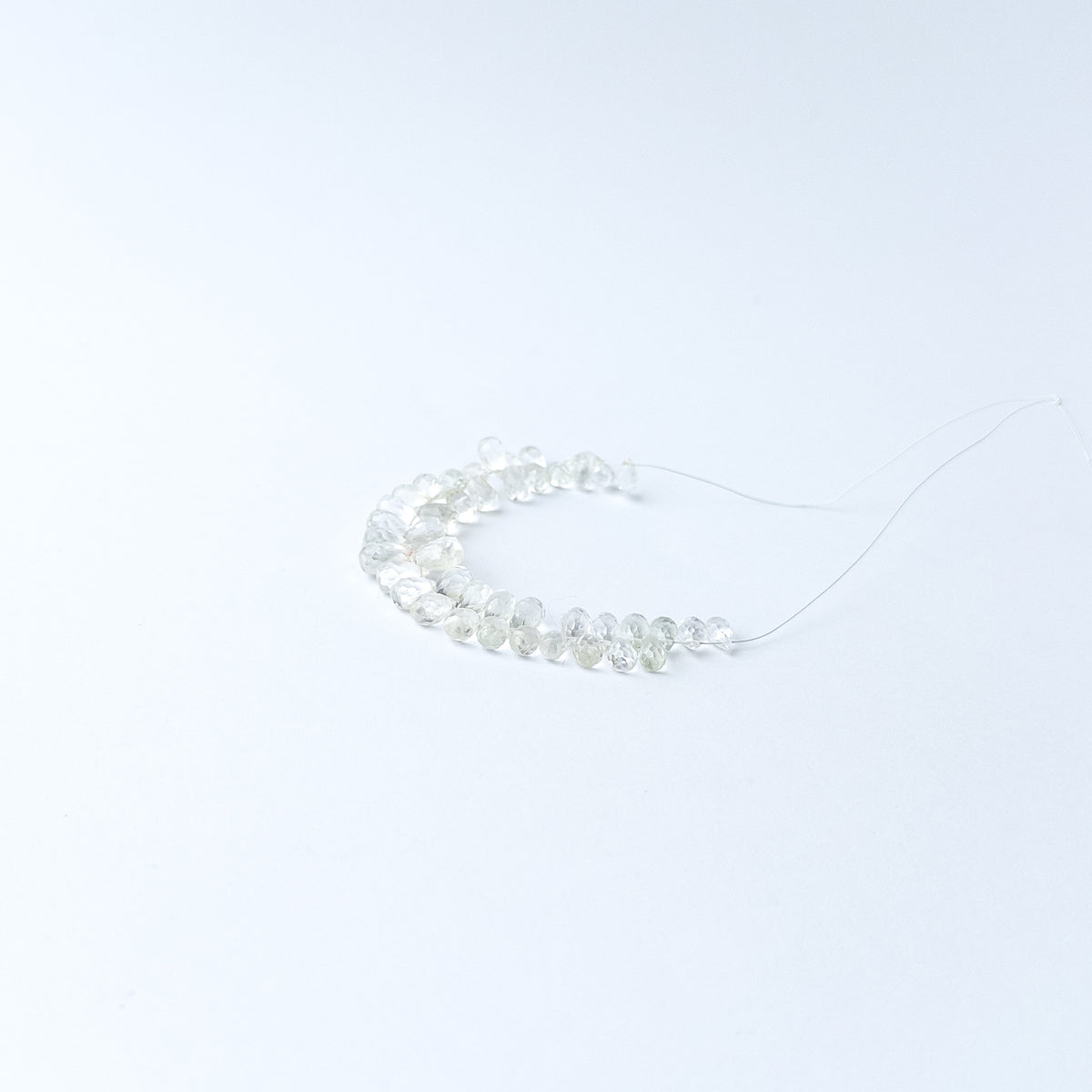 Faceted Green Amethyst gemstone beads in graduated sizes adding elegance and dimension to jewellery creations.