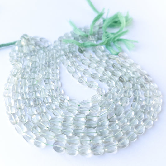 Green Amethyst faceted oval 6–7mm genuine gemstone beads arranged in a sparkling 20cm strand for handmade jewellery.