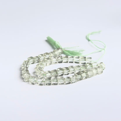 Smooth cube green amethyst beads displayed with clean surfaces ideal for gemstone jewellery making.