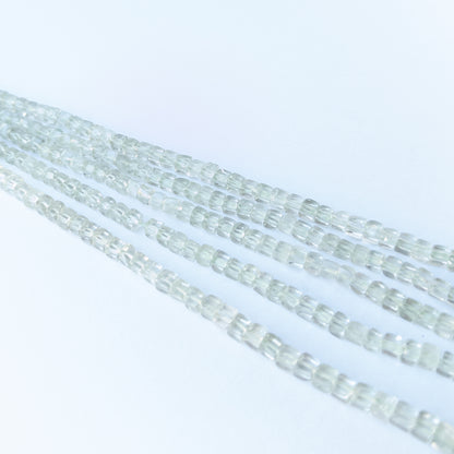 Handmade jewellery components featuring authentic Green Amethyst smooth cube beads with gentle pastel sparkle.
