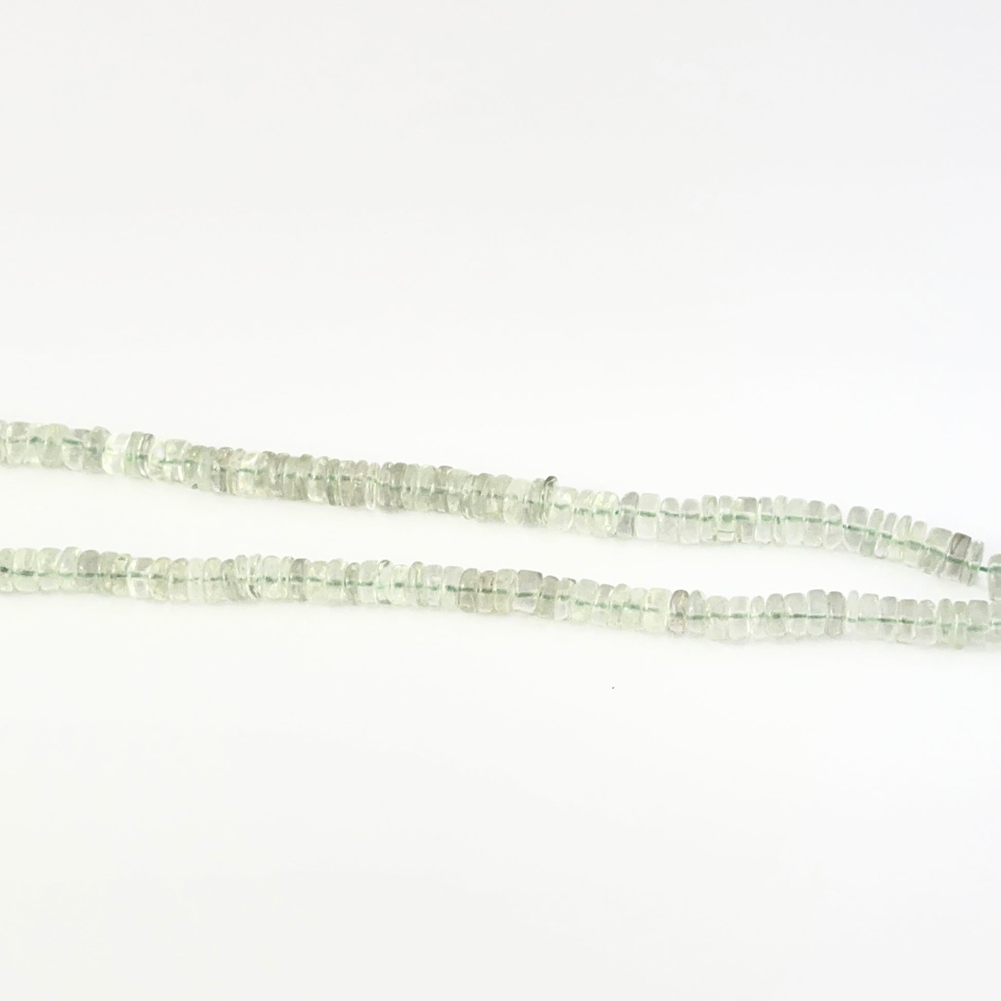 Green amethyst smooth wheel gemstones, 5.5–6.0mm bead size, 21cm strand length.