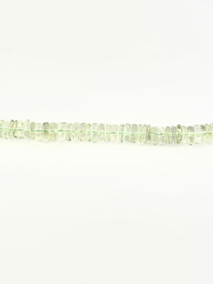 Light green amethyst wheel beads in 6.5–7.0mm sizing on a 21cm strand.