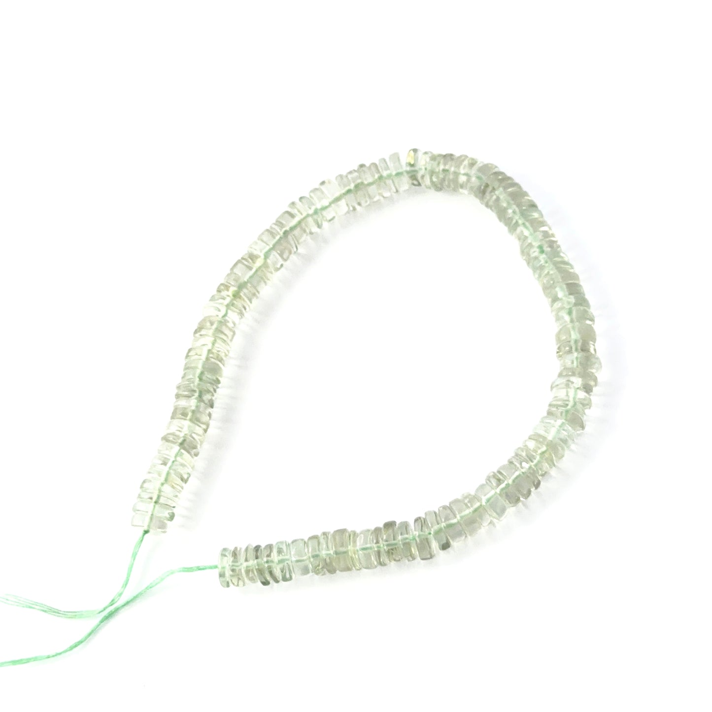 Green amethyst smooth wheel beads, 6.5–7.0mm, on a 21cm strand.