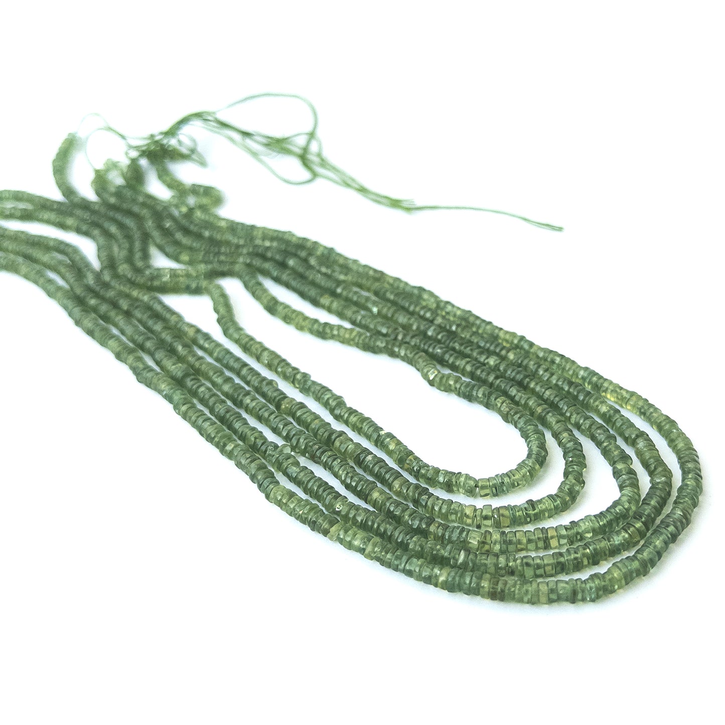 Authentic green apatite gemstone beads showcasing vibrant green tones and uniform smooth wheel cuts.