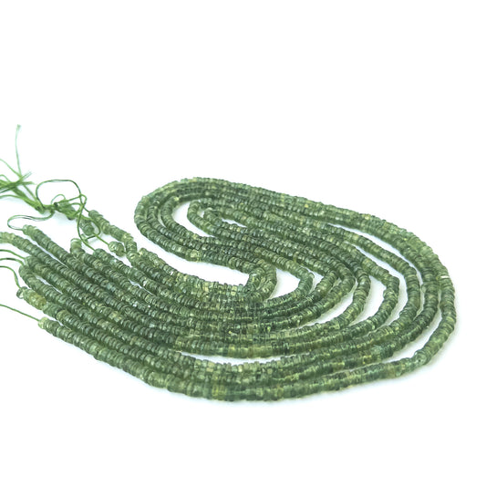 Genuine green apatite stone beads with polished smooth wheel shaping, ideal for DIY jewellery and artisan beadwork.