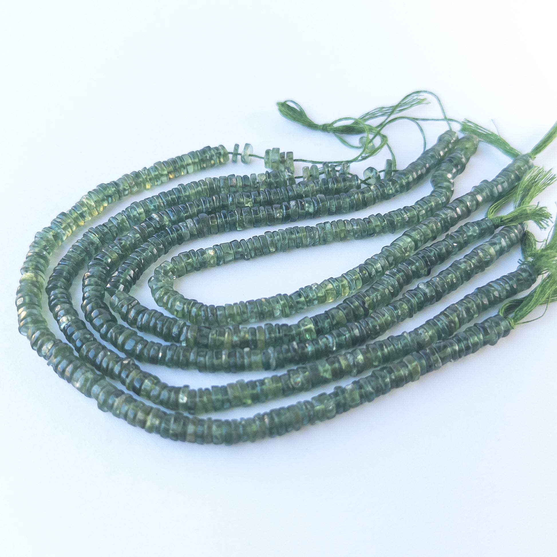 Genuine Green Apatite smooth wheel stone beads with polished surfaces ideal for gemstone beads for DIY jewellery making.