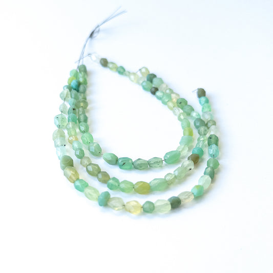 Handmade jewellery components using premium Green Chalcedony faceted ovals with bright shine and soft green tones.