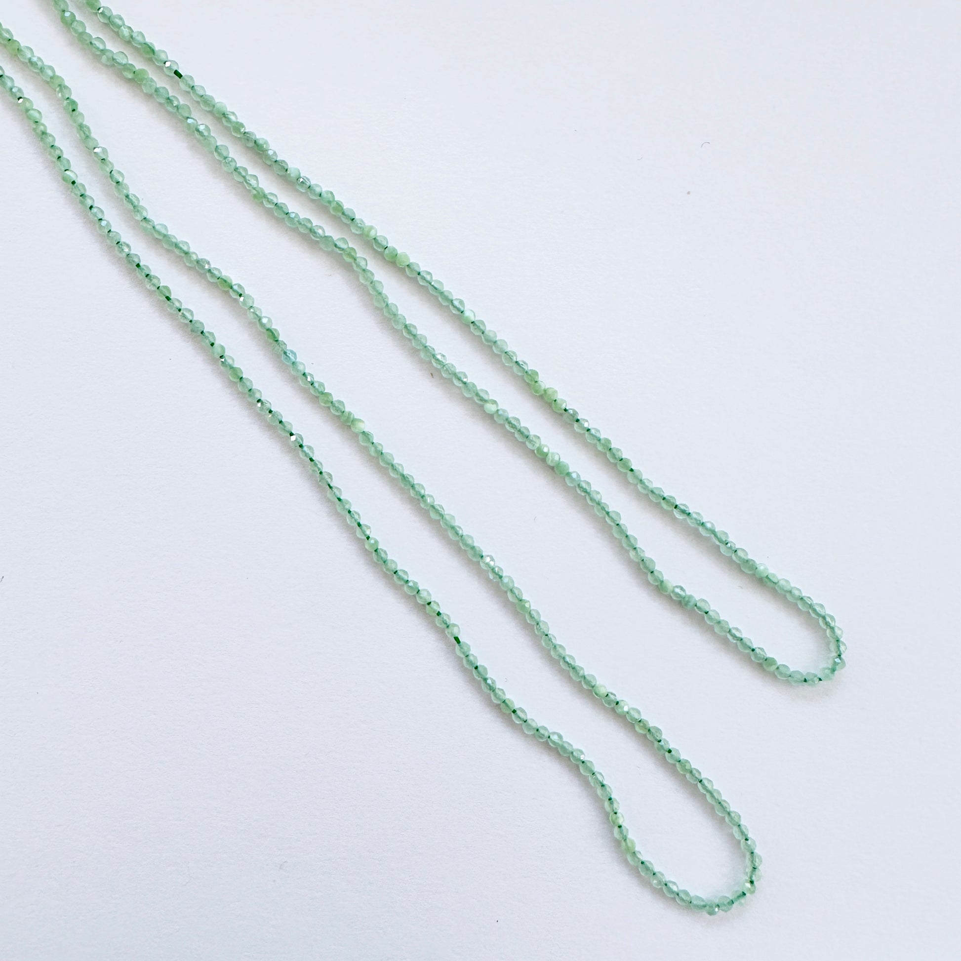 Green Chalcedony stone beads with precise faceted rondelle cut and premium polish.