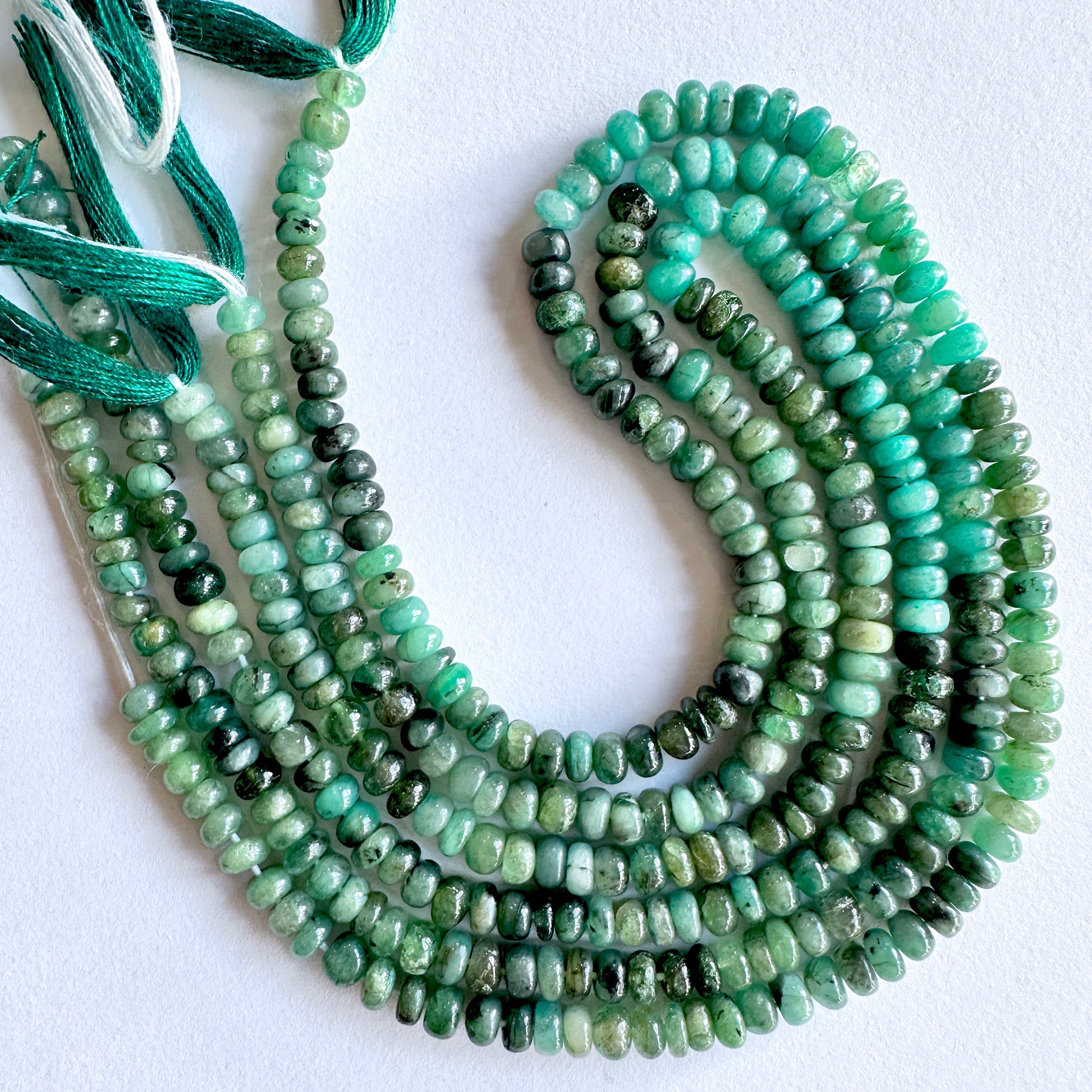 Handmade jewellery components Australia using Green Emerald beads with elegant shine and cut.
