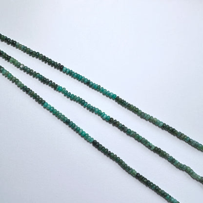 Australian gemstone bead supplier showcasing Green Emerald rondelle beads with 0.5mm drill holes.