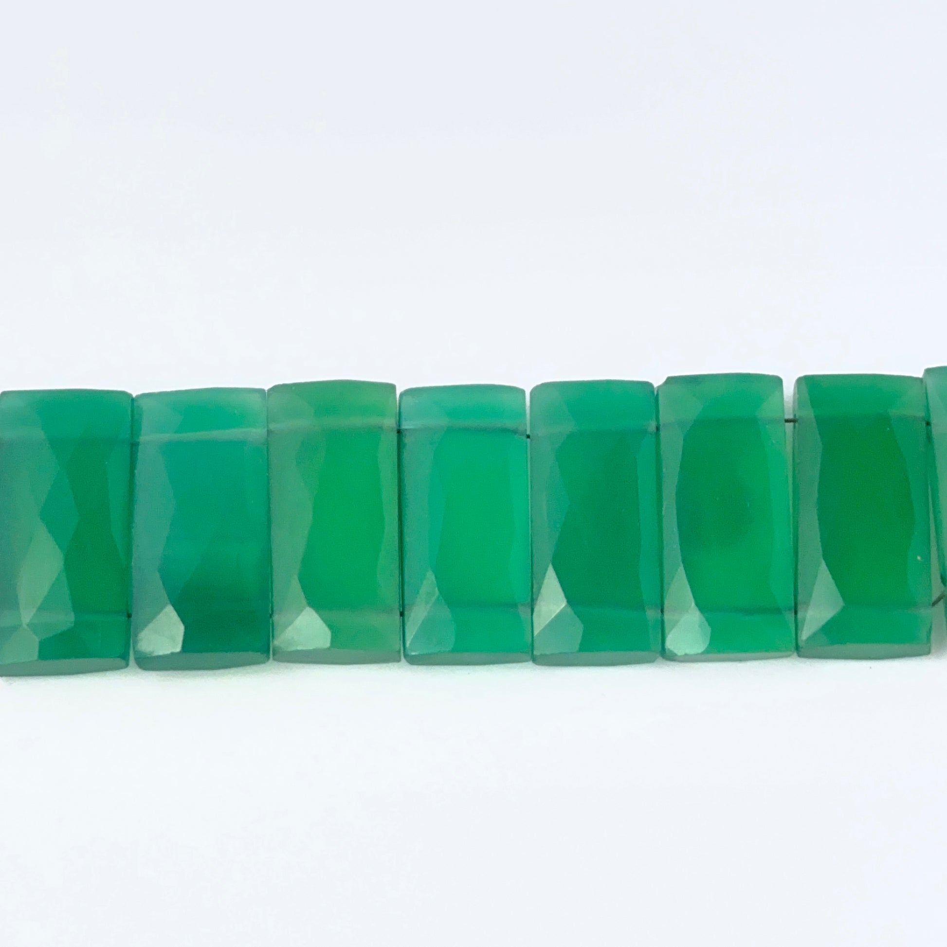 Green Onyx faceted rectangle stone beads showing rich colour and shine, ideal for genuine gemstone beads in DIY jewellery.