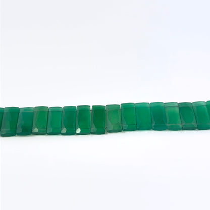 Close view of Green Onyx faceted rectangle stone beads showing cut, clarity and shimmer for DIY jewellery makers.