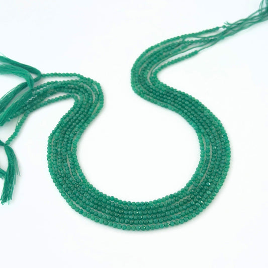 Green Onyx rondelle beads with vivid green tone and reflective faceting for creative jewellery designs