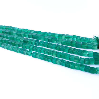 Vibrant green onyx beads in smooth cube cut, perfect for gemstone beads for DIY jewellery projects.