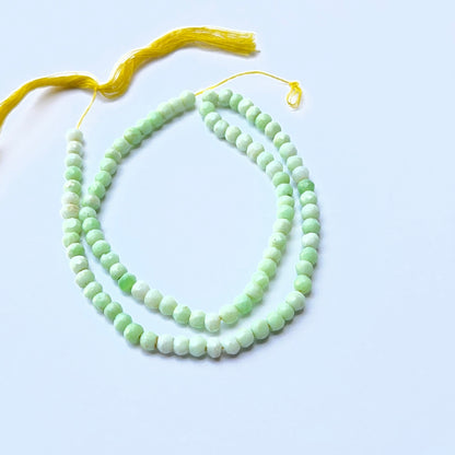 Green Opal faceted rondelle natural gemstone beads in 4.3–4.5mm on a 32cm strand, showing soft green sparkle for DIY jewellery.