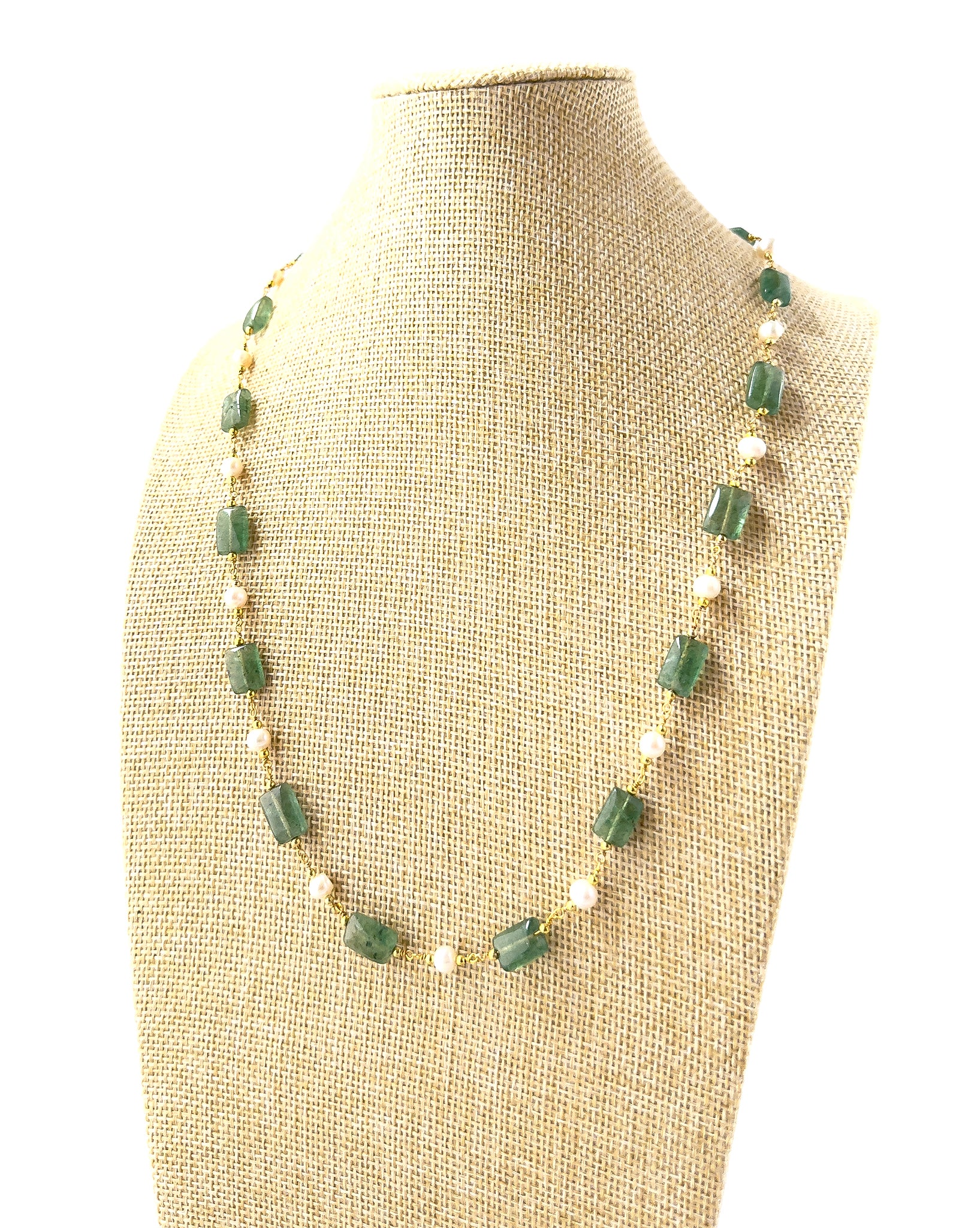 Genuine Quartz necklace featuring smooth rectangular beads, showcasing clear shine and elegant elongated shapes.