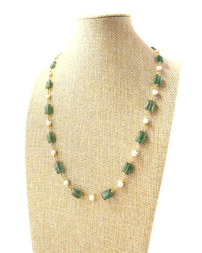 Genuine Quartz necklace featuring smooth rectangular beads, showcasing clear shine and elegant elongated shapes.