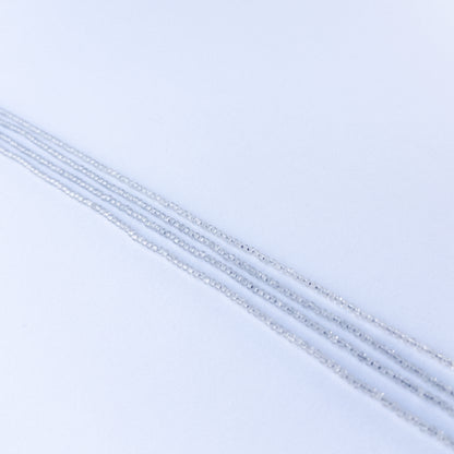 Soft grey Chalcedony faceted rondelle stone beads 2.2mm displayed neatly for DIY jewellery and authentic gemstone designs.