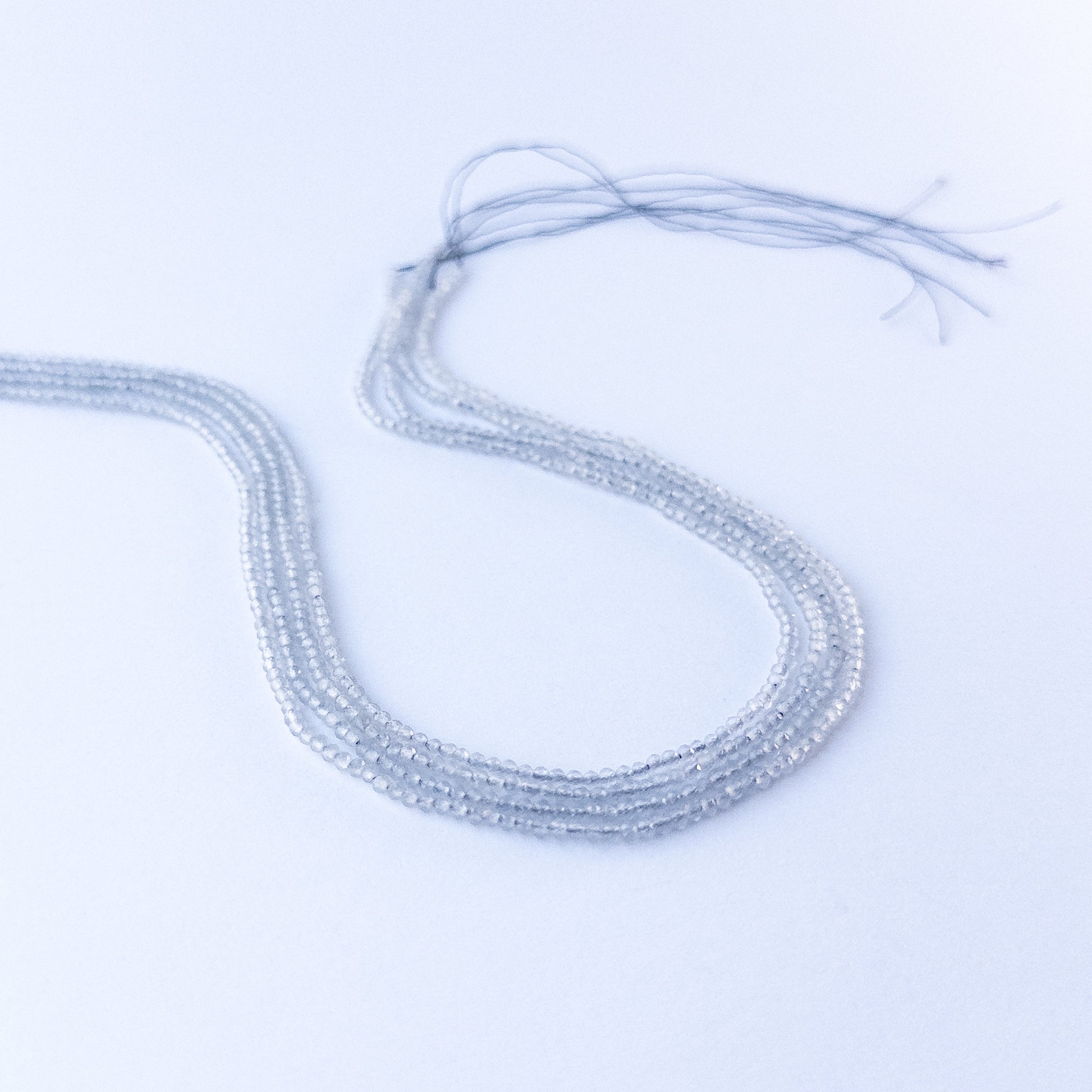Handmade jewellery components featuring authentic Grey Chalcedony faceted rondelle beads with gentle shimmer.