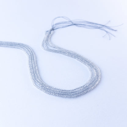 Handmade jewellery components featuring authentic Grey Chalcedony faceted rondelle beads with gentle shimmer.