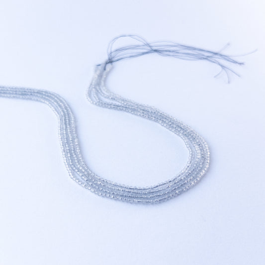 Handmade jewellery components featuring authentic Grey Chalcedony faceted rondelle beads with gentle shimmer.