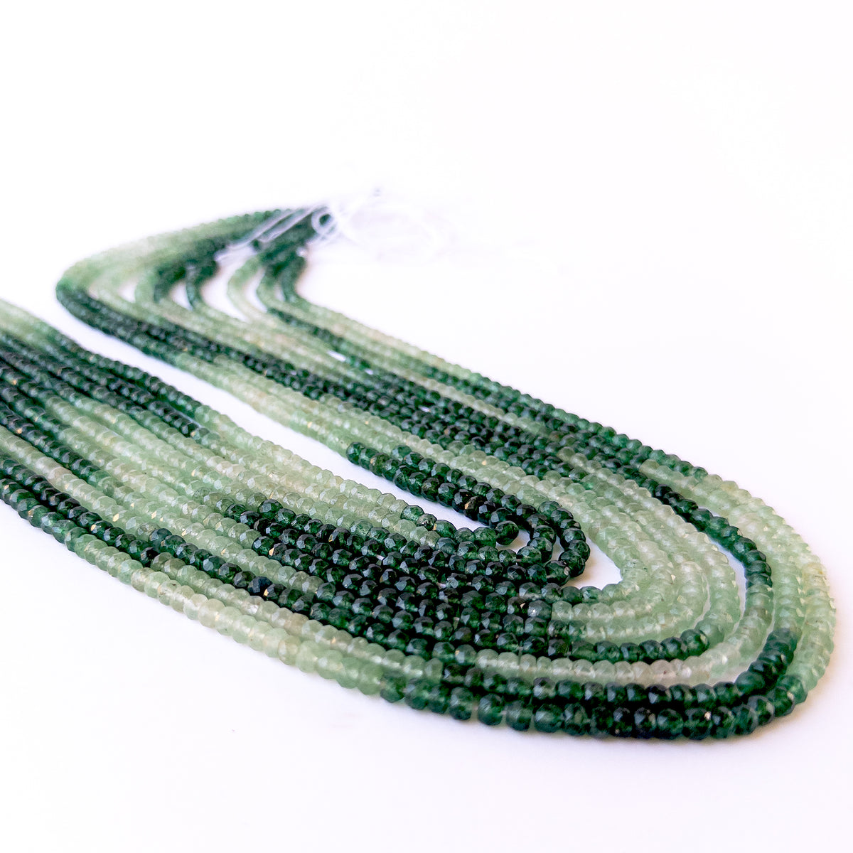 High‑quality Shaded Green Quartz gemstone beads with brilliant faceting and natural colour variation.