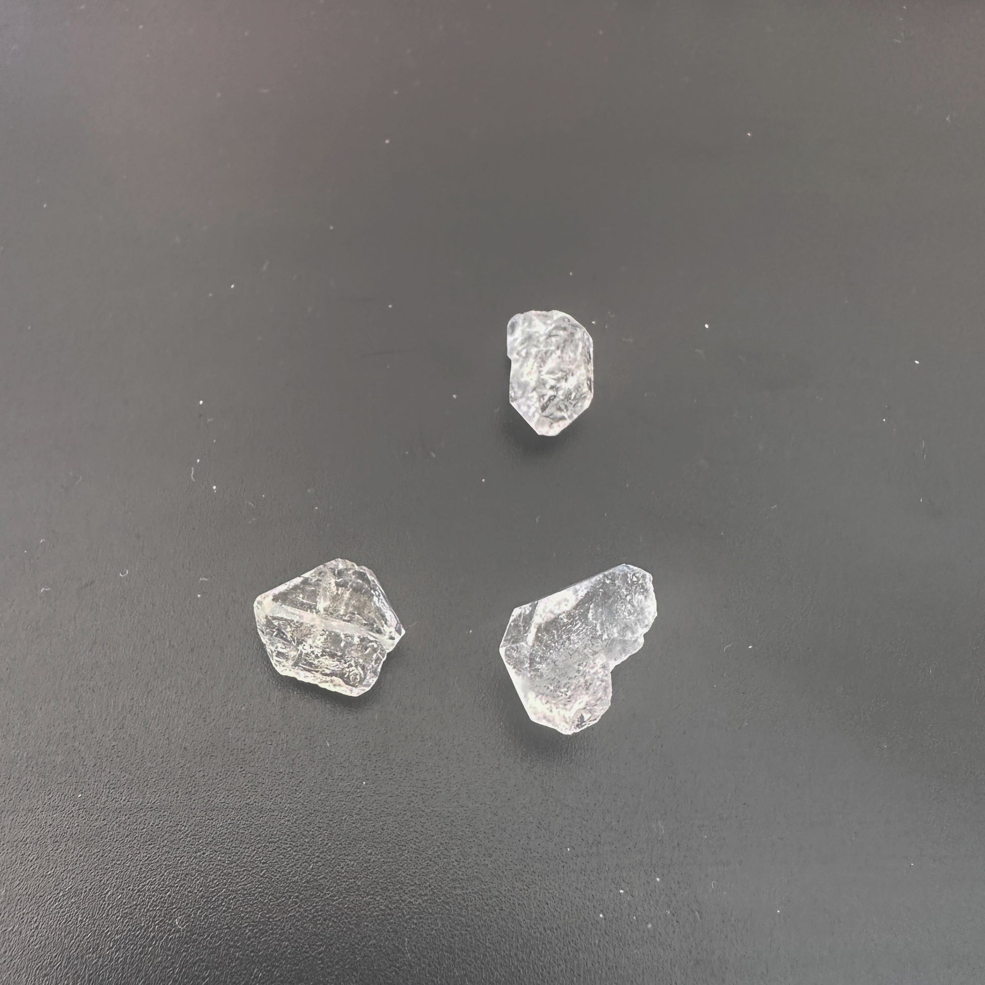 Close-up of raw Herkimer crystals showing brilliant shine and organic formation.