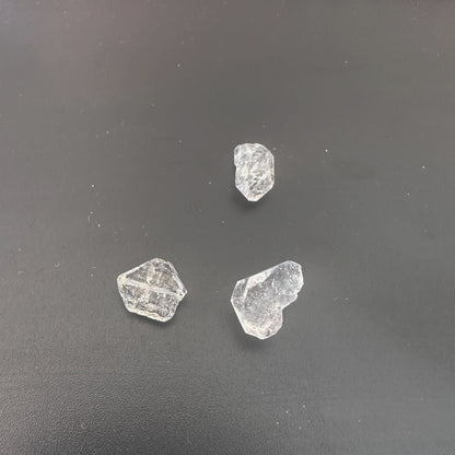 Close-up of raw Herkimer crystals showing brilliant shine and organic formation.