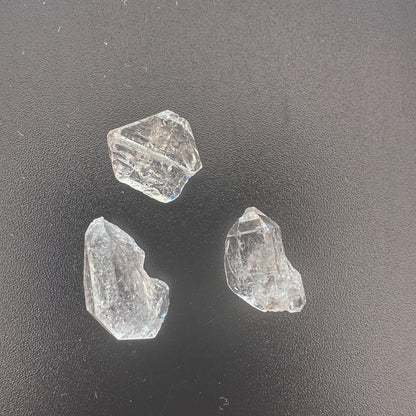 Three-piece Herkimer diamond set with high transparency and unique crystal shapes.