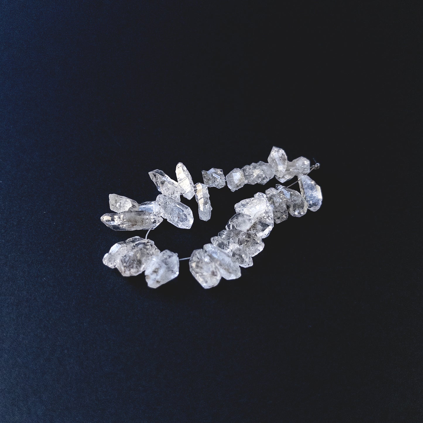Authentic Herkimer Diamond rough beads showcasing natural double‑terminated shapes and raw brilliance.