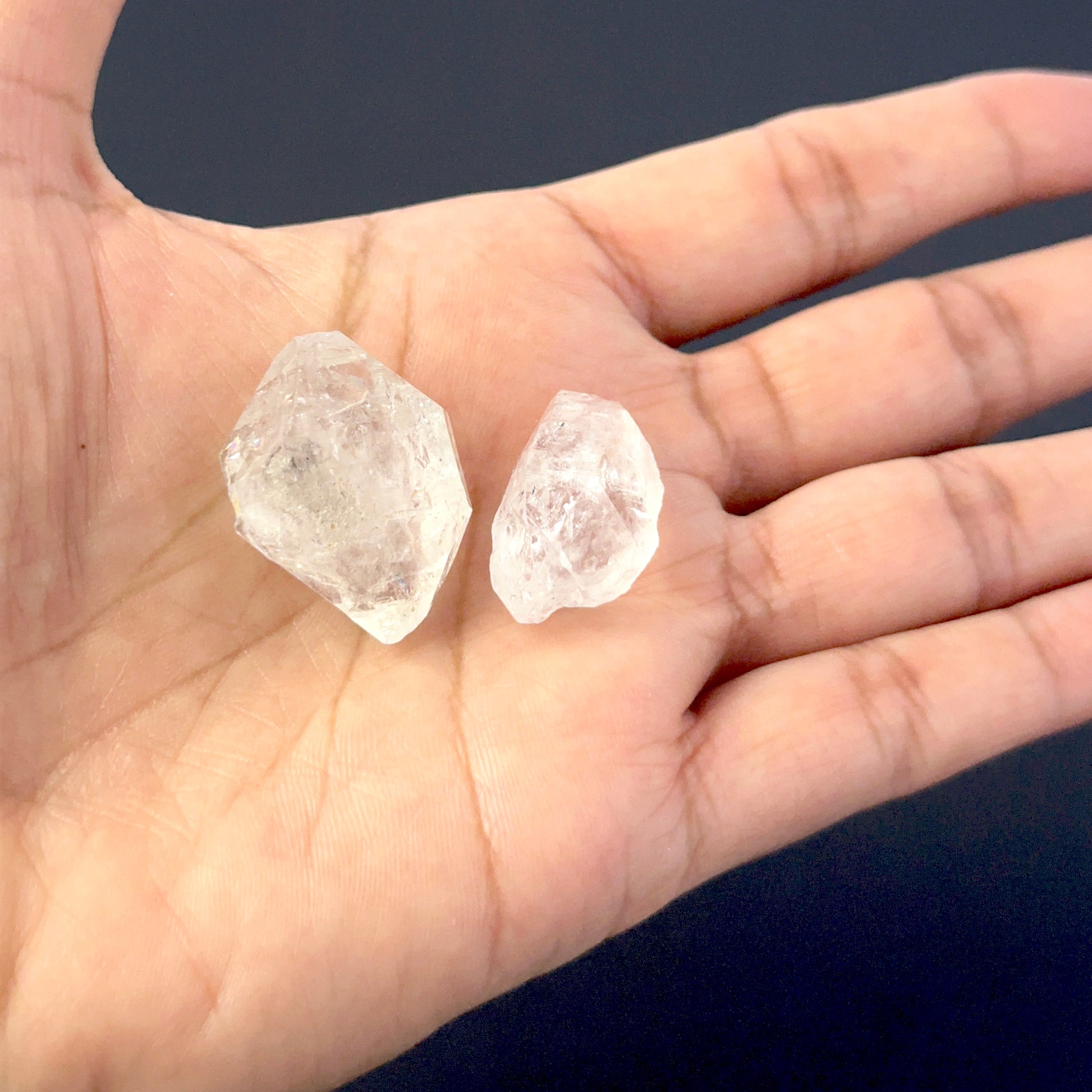 Faceted Herkimer Diamond points arranged neatly, highlighting their sparkle and handmade jewellery component quality.