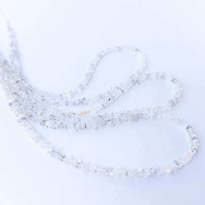 Handmade jewellery components featuring authentic Herkimer Diamond chip beads with bright reflective shine.