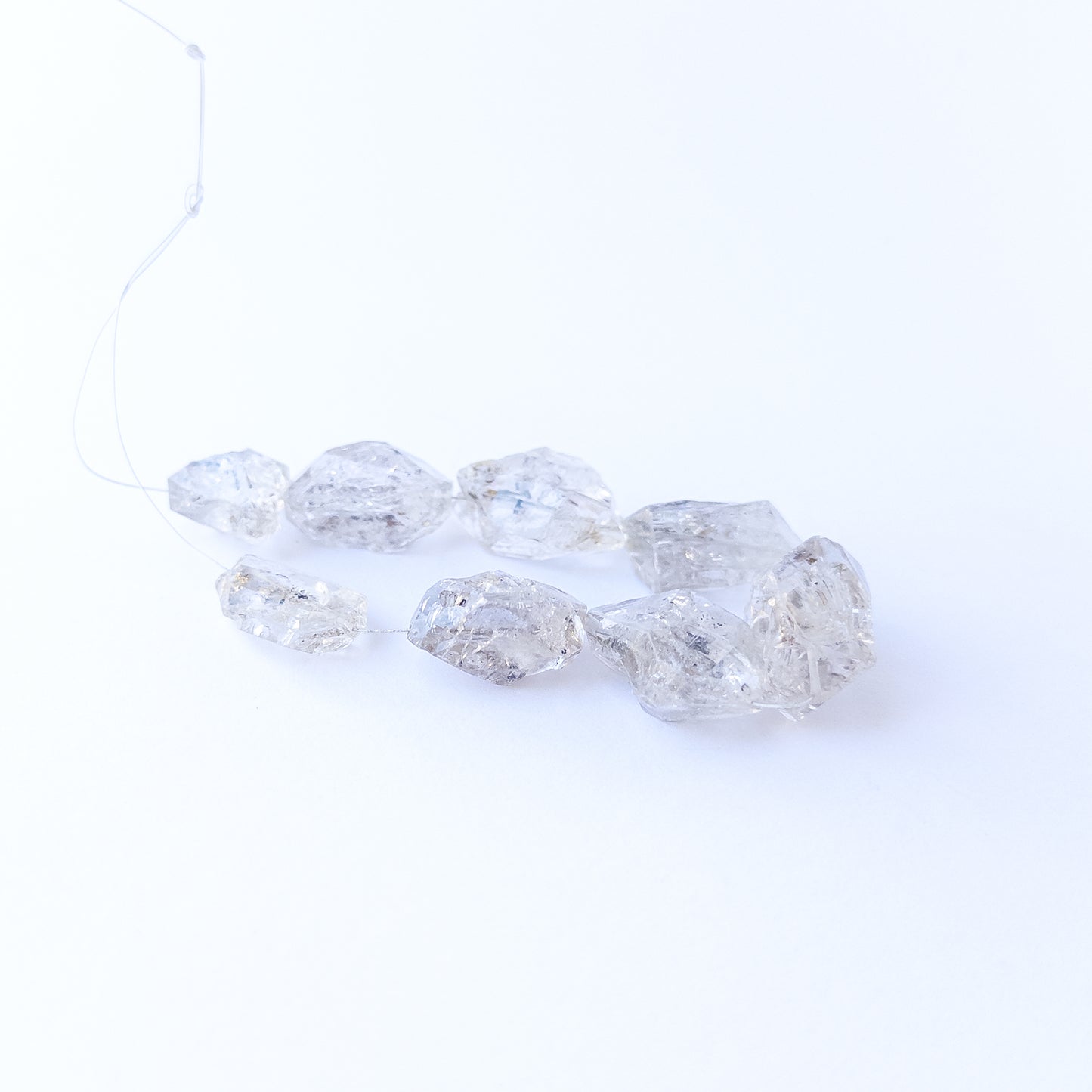 Herkimer Diamond rough beads for DIY jewellery projects showing crisp edges and natural brilliance.
