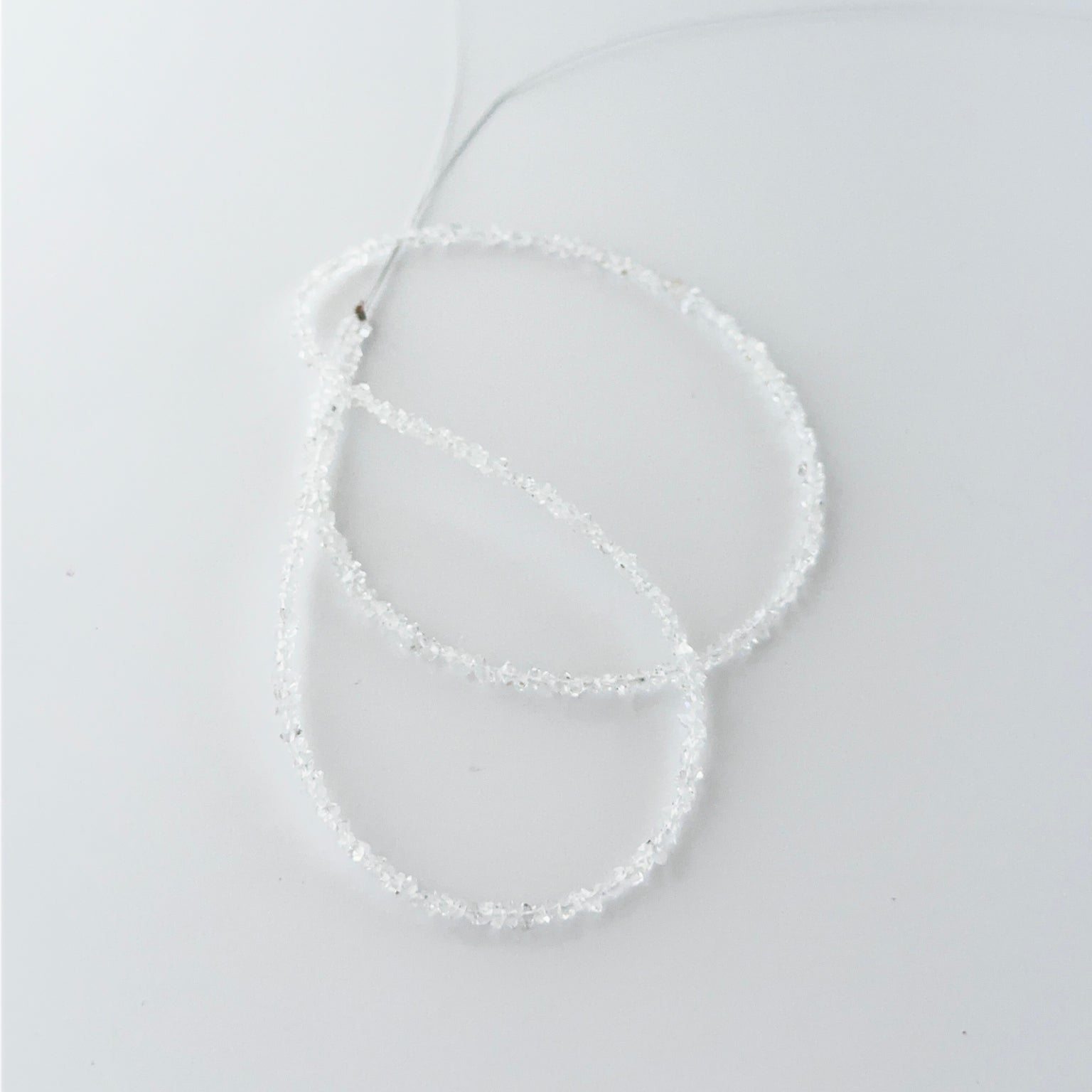Herkimer Diamond chip beads showing bright clarity and natural crystal texture