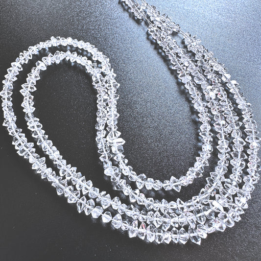 Natural gemstone beads for DIY jewellery featuring Herkimer Diamond with centre-drilled rugged finish.